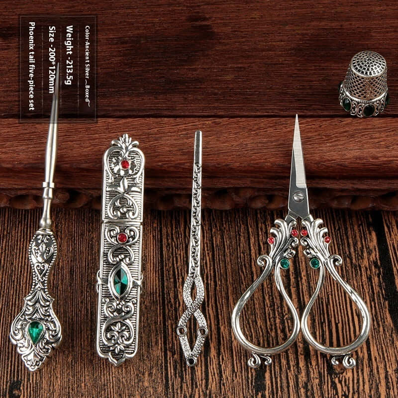 Affordable Luxury Inlaid With Phoenix Tail Scissors Set - five-piece scissors set with intricate designs.