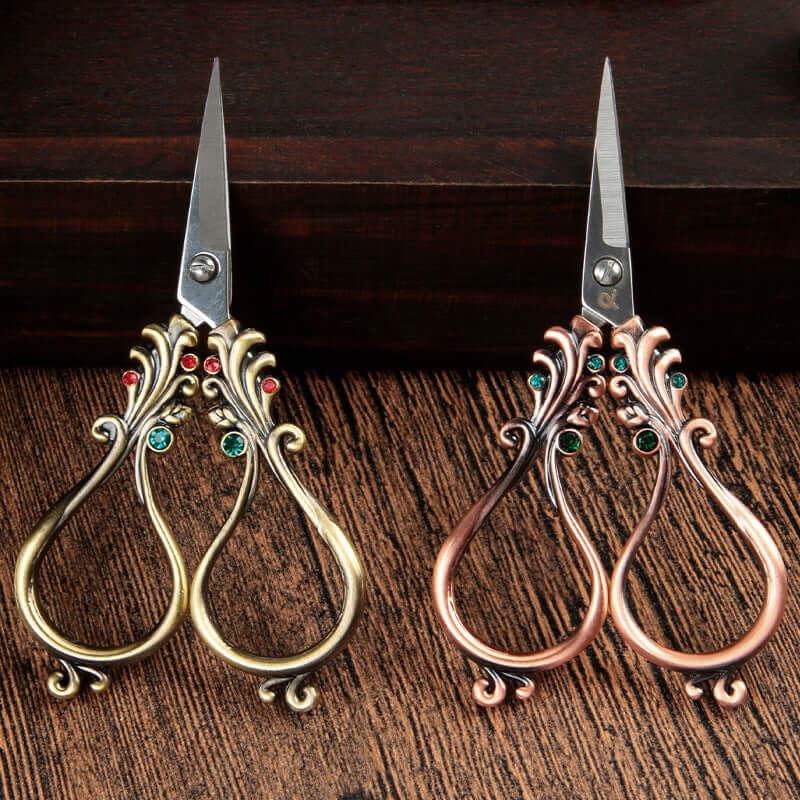  Affordable Luxury Inlaid With Phoenix Tail Scissors Set - five-piece scissors set with intricate designs.