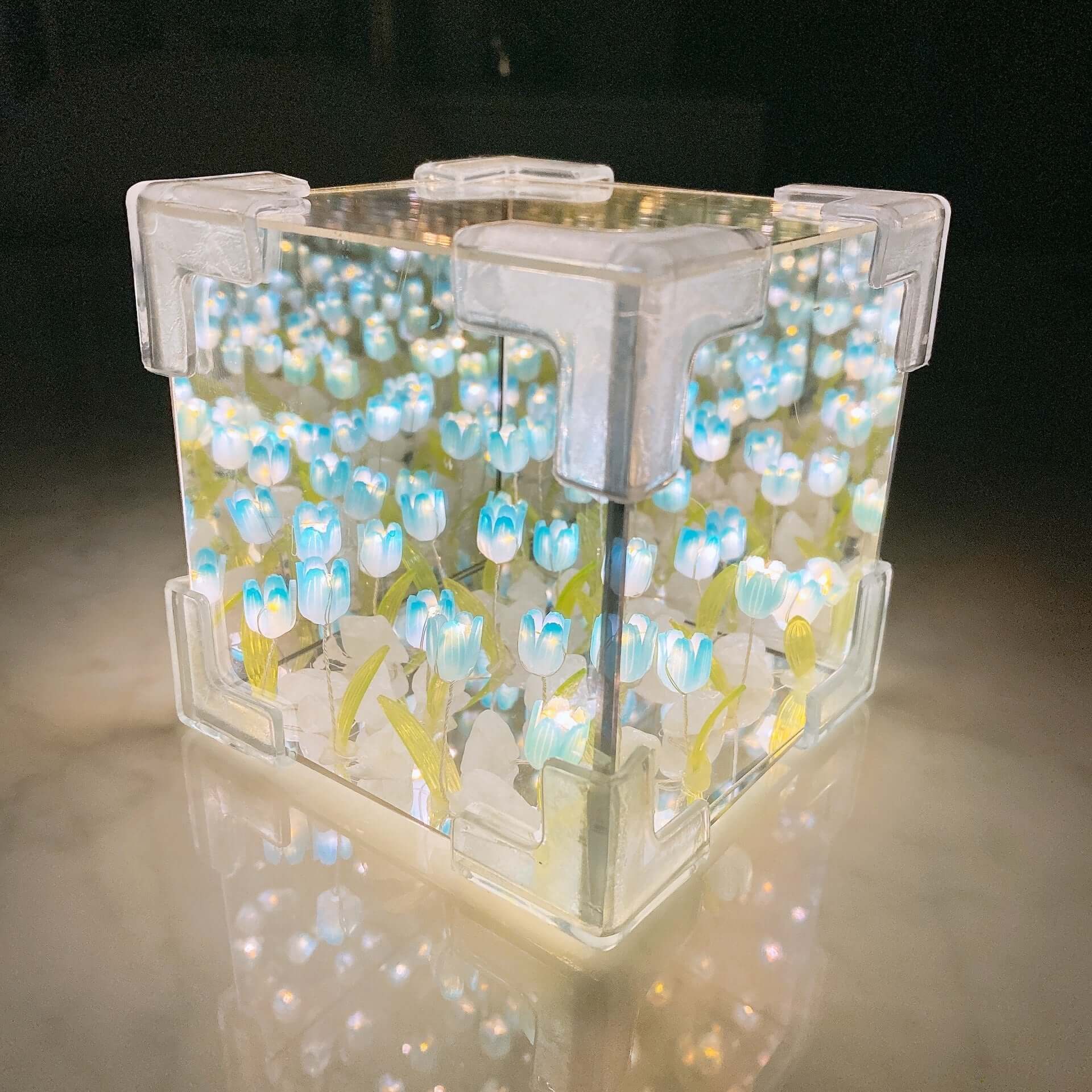 Handmade DIY tulip flower night light in a clear cube design, creating a romantic atmosphere for home decor.