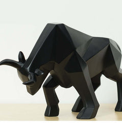 Geometric black resin bull sculpture highlighting modern decor for home and office, perfect for art lovers and gifts.
