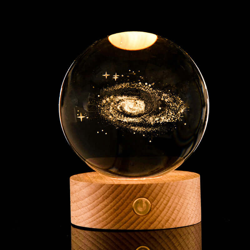 The Luminous Galaxy Crystal Ball features 3D laser-carved galaxies for a magical decor piece that glows—ideal for gifts, desks, or nightstands.