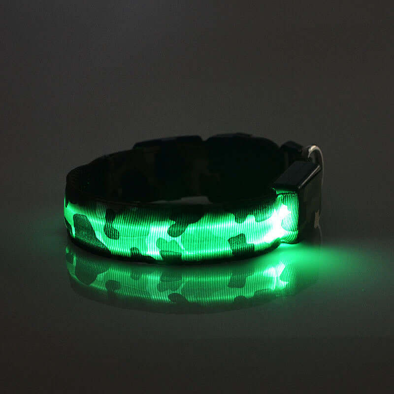 Camouflage luminous dog collar with green LED lights, made of durable nylon and plastic for nighttime visibility.