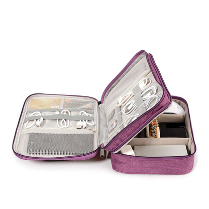 Open purple cable organizer bag showing compartments for cables, chargers, and electronic accessories.
