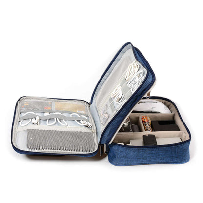 Open blue cable organizer bag showcasing mesh pockets and compartments for storing electronic accessories.