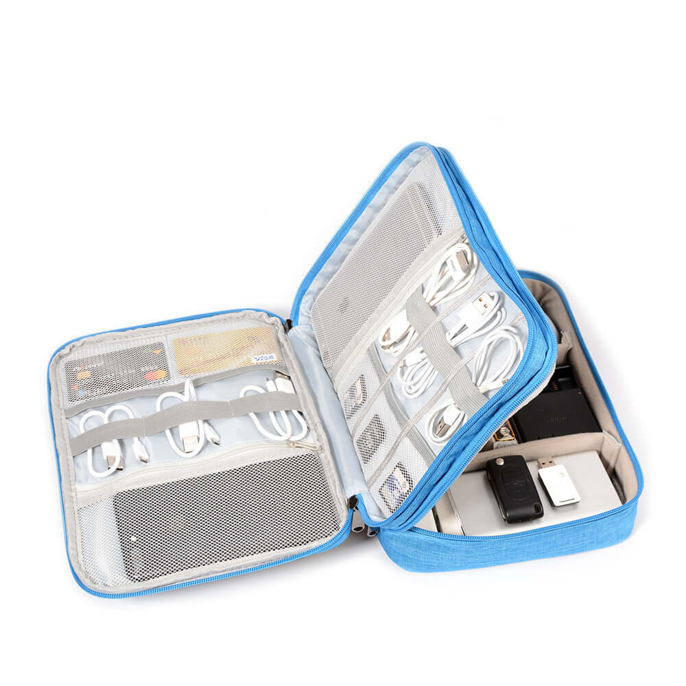 Blue cable organizer bag open, showcasing compartments for digital camera accessories, cables, and chargers.