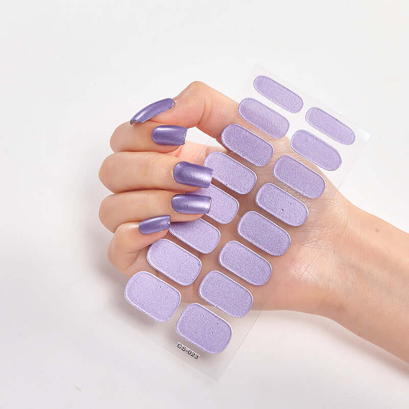 Pure Color 16 Nail Stickers in lavender shade on a hand with manicured nails, showcasing a stylish nail design.