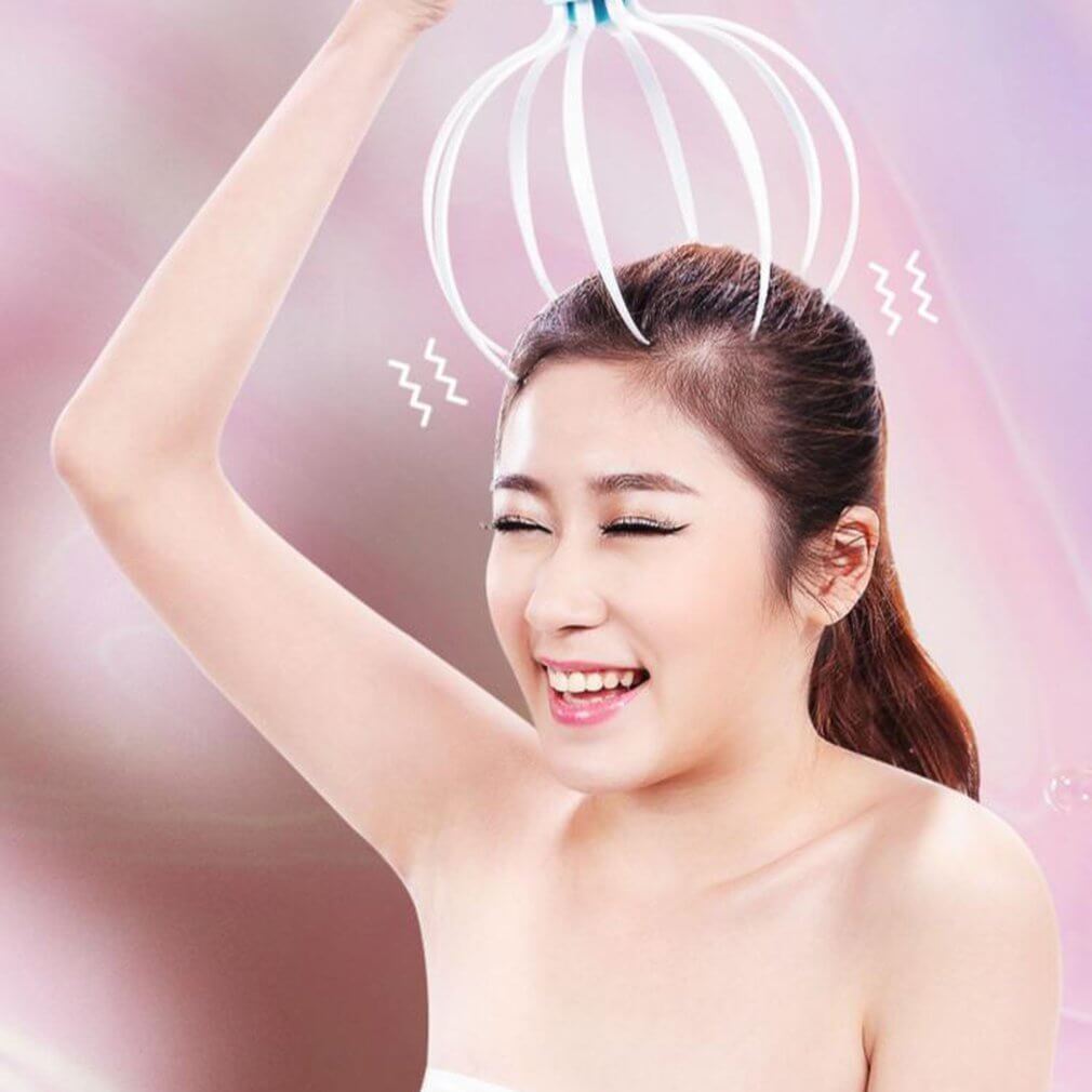 Woman enjoying scalp massage with an electric head massager featuring eight flexible claws for relaxation and hair growth.