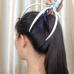 A woman using an eight-claw electric scalp massager for relaxation and hair growth.