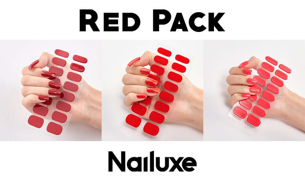 Nail luxe red pack featuring three sets of red nail stickers displayed on manicured hands.