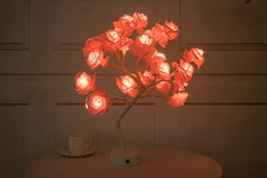  Rose flower lamps in pink and white on a marble table with soft lighting, ideal for elegant home decor.