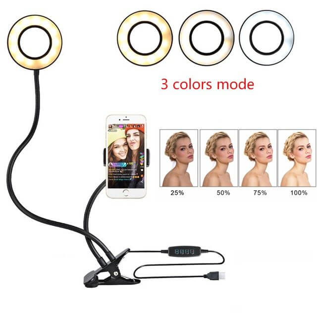 LED selfie ring light with 3 color modes, adjustable brightness, and phone holder for makeup and live streaming.