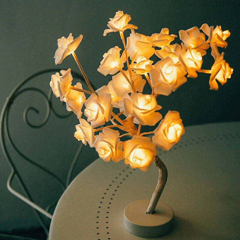  Rose flower lamps in pink and white on a marble table with soft lighting, ideal for elegant home decor.