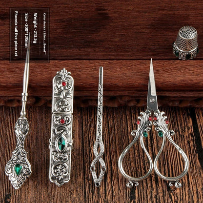  Affordable Luxury Inlaid With Phoenix Tail Scissors Set - five-piece scissors set with intricate designs.
