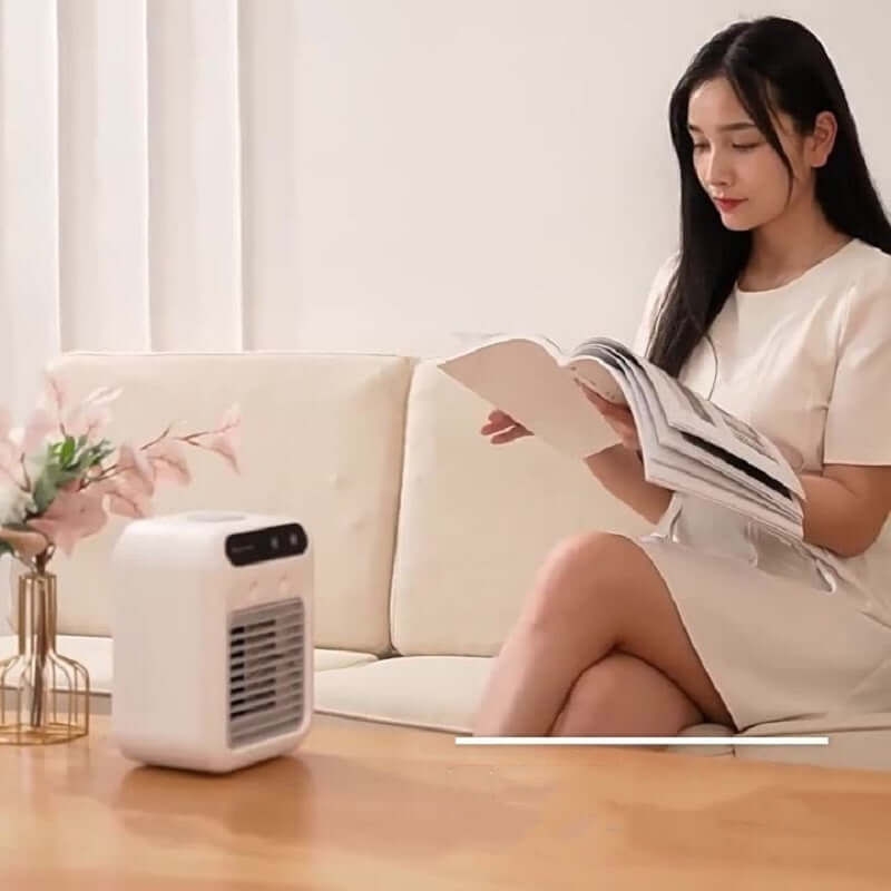 This portable air conditioner cools your space with water fan technology. Ideal for home, office, or car. Lightweight and energy-efficient.