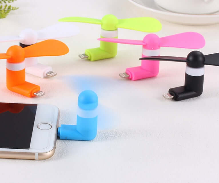 Colorful mobile mini fans for phones, compatible with iPhones and Androids, compact and low noise for cool, refreshing breeze.