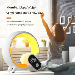 Person waking up comfortably to the Creative Q Light Alarm Clock with LED wake-up light features.
