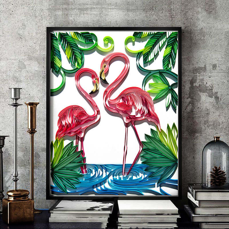 Flamingo paper illustration in vibrant colors, framed artwork of two flamingos surrounded by tropical greenery.