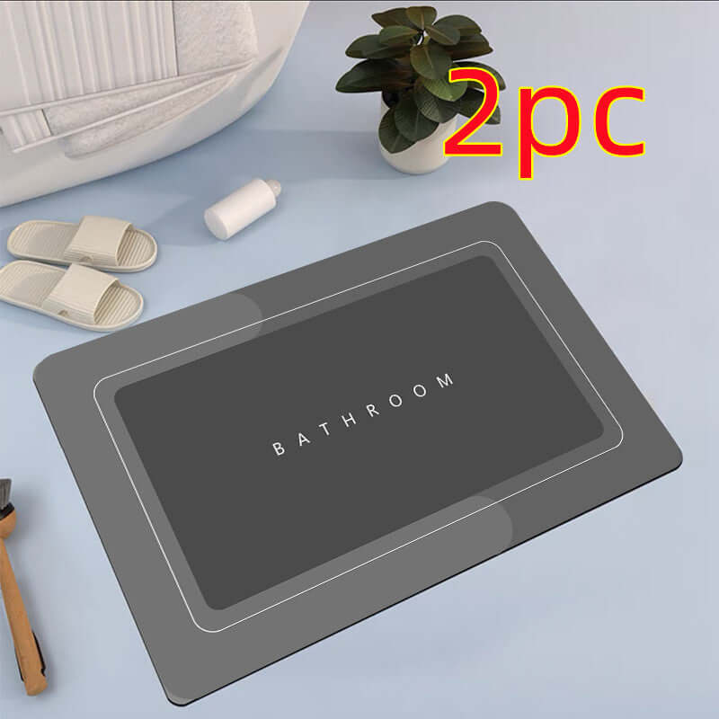 Modern bathroom floor mat set in dark gray with 'BATHROOM' text, featuring absorbent and quick-drying properties.
