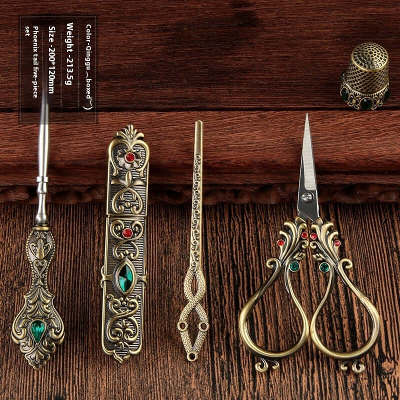  Affordable Luxury Inlaid With Phoenix Tail Scissors Set - five-piece scissors set with intricate designs.