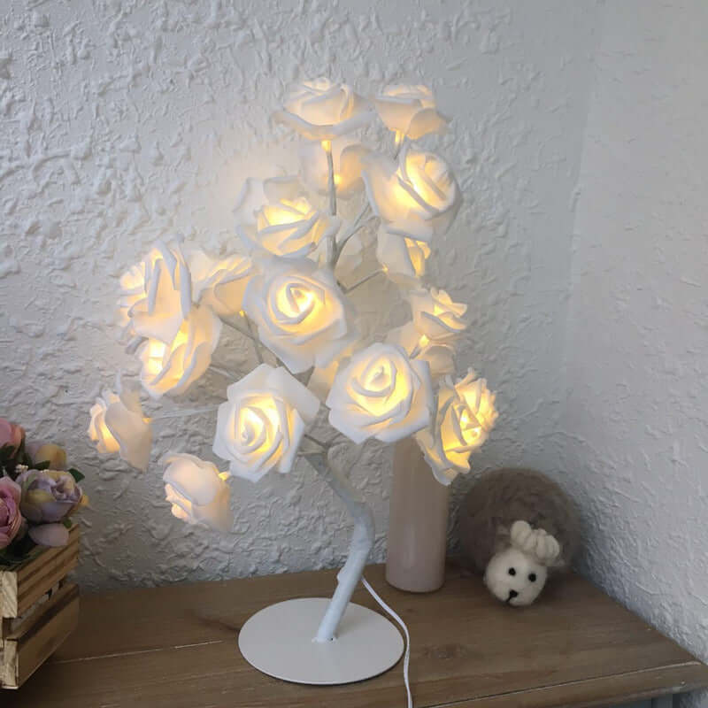  Rose flower lamps in pink and white on a marble table with soft lighting, ideal for elegant home decor.