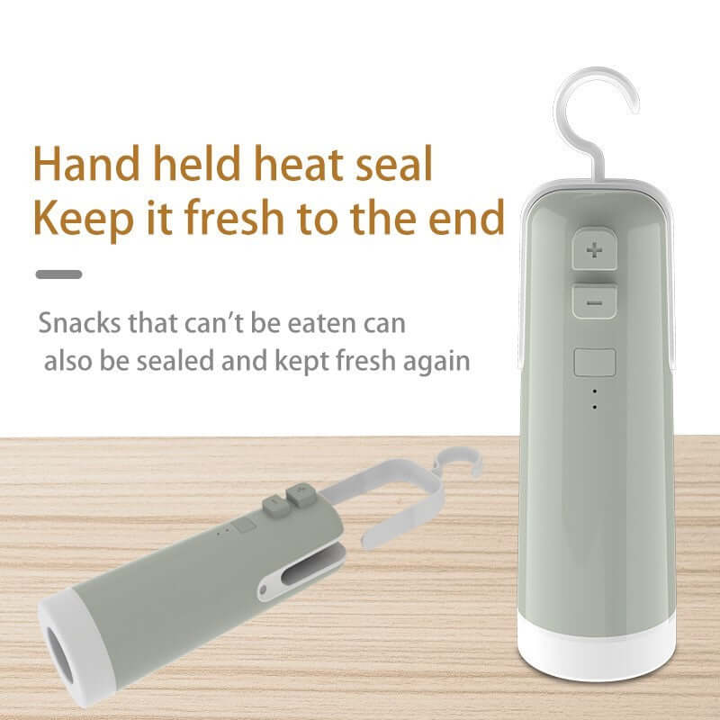 Handheld vacuum sealer for snacks, featuring a heat seal function to keep food fresh and minimize waste.
