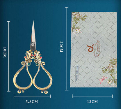  Affordable Luxury Inlaid With Phoenix Tail Scissors Set - five-piece scissors set with intricate designs.