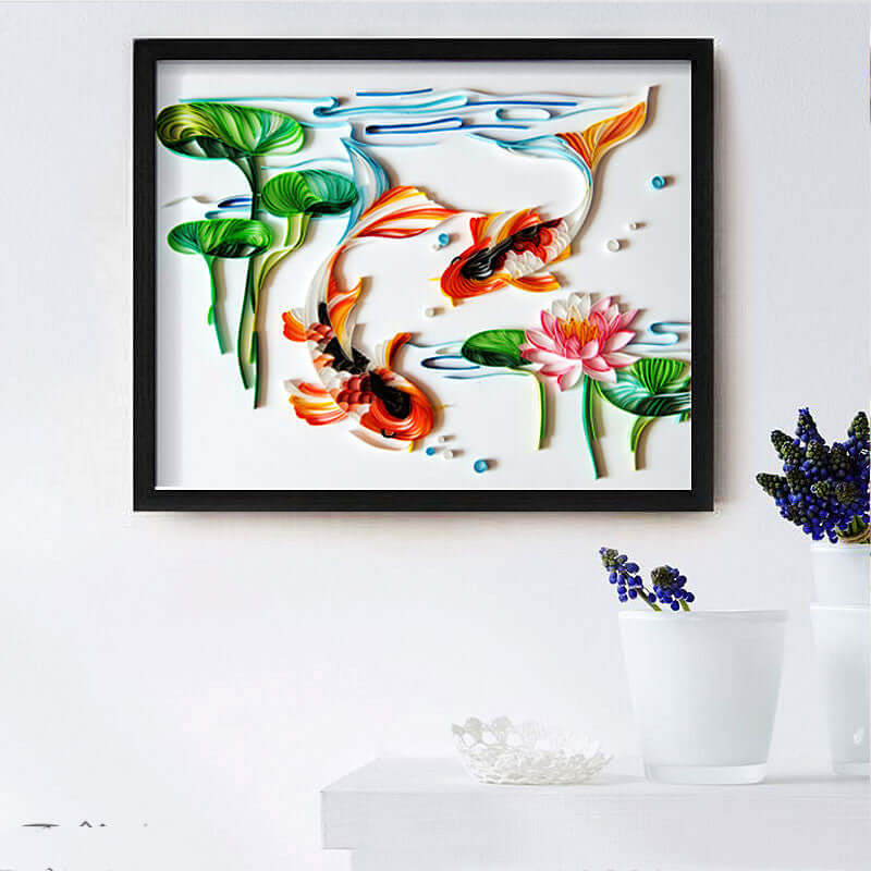 Framed paper illustration of goldfish and lotus flowers, ideal for home decor and gifts, showcasing vibrant colors and artistry.