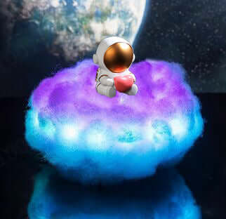 This astronaut lamp features colorful clouds and a rainbow glow—perfect as a children's night light or a fun, creative gift for any space lover.