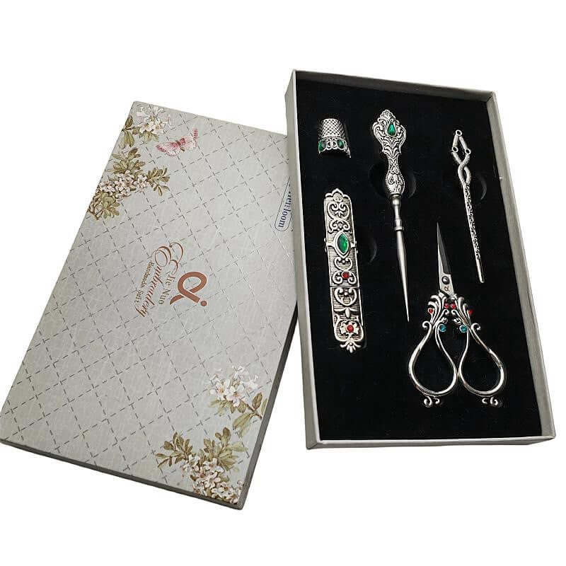  Affordable Luxury Inlaid With Phoenix Tail Scissors Set - five-piece scissors set with intricate designs.