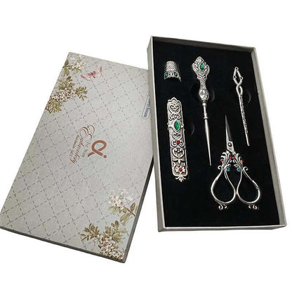  Affordable Luxury Inlaid With Phoenix Tail Scissors Set - five-piece scissors set with intricate designs.