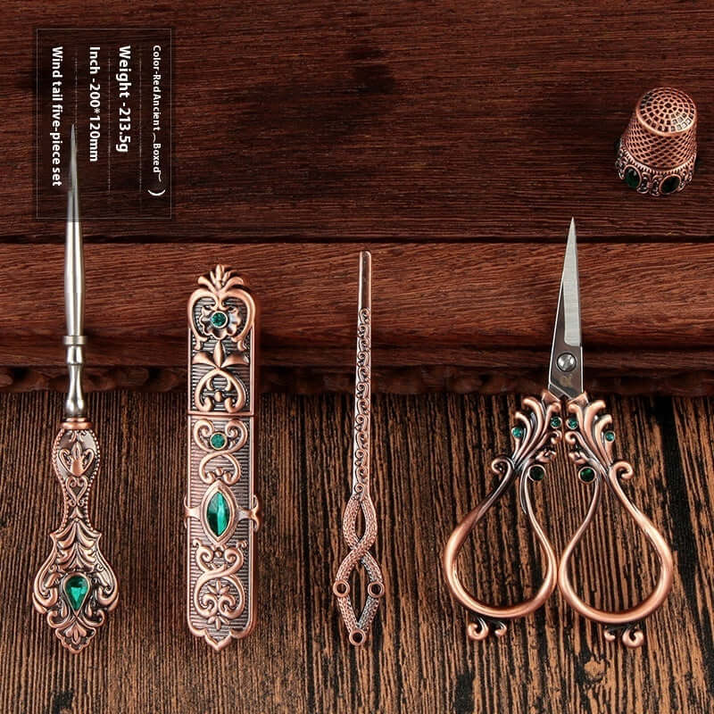  Affordable Luxury Inlaid With Phoenix Tail Scissors Set - five-piece scissors set with intricate designs.