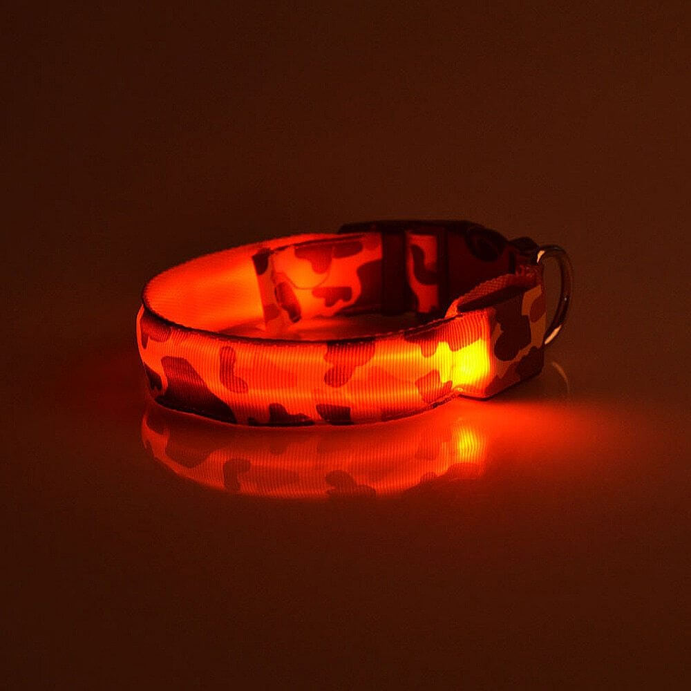 Luminous camouflage dog collar glowing in the dark, made of durable nylon for nighttime visibility.