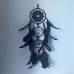 Black and white Indian dreamcatcher pendant with feathers, ideal for European style home decoration.