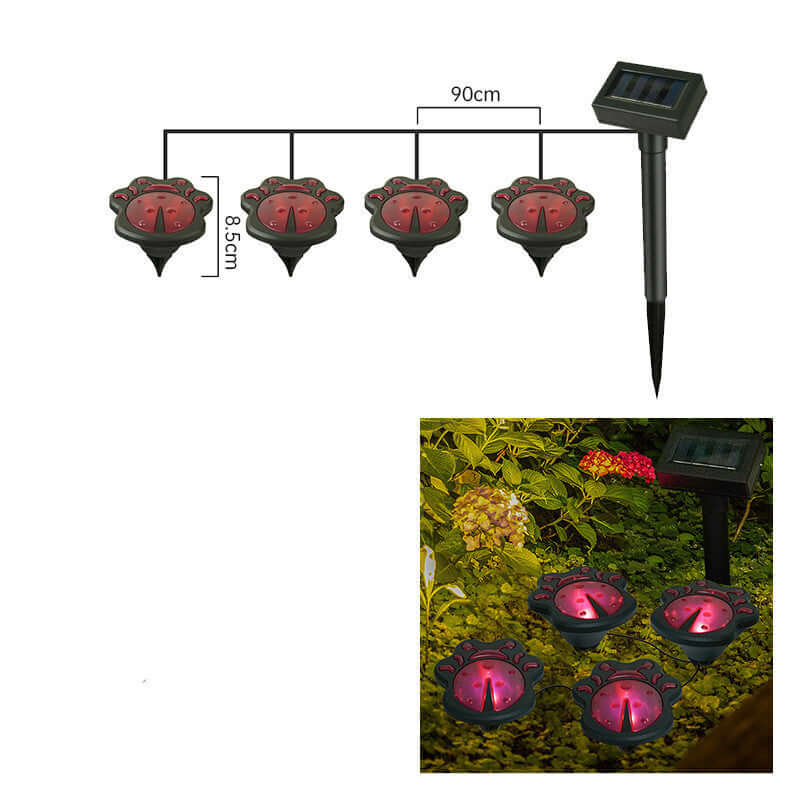 Waterproof solar bird light string with LED lamps in garden, featuring four red decorative lights for home decor.