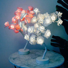 Rose flower lamps in pink and white on a marble table with soft lighting, ideal for elegant home decor.