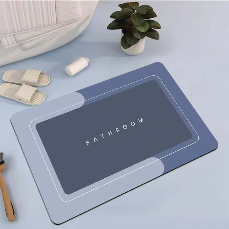 Modern bathroom floor mat in Baikal blue with 'BATHROOM' text, designed for absorbency and quick-drying.