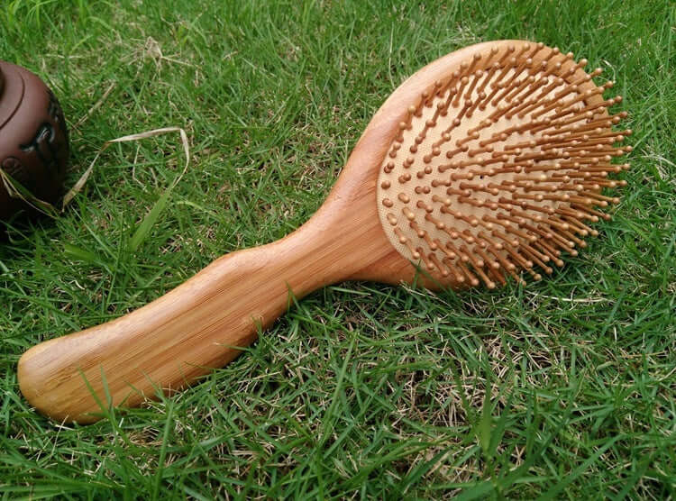 Portable massage comb for stress relief and hair care