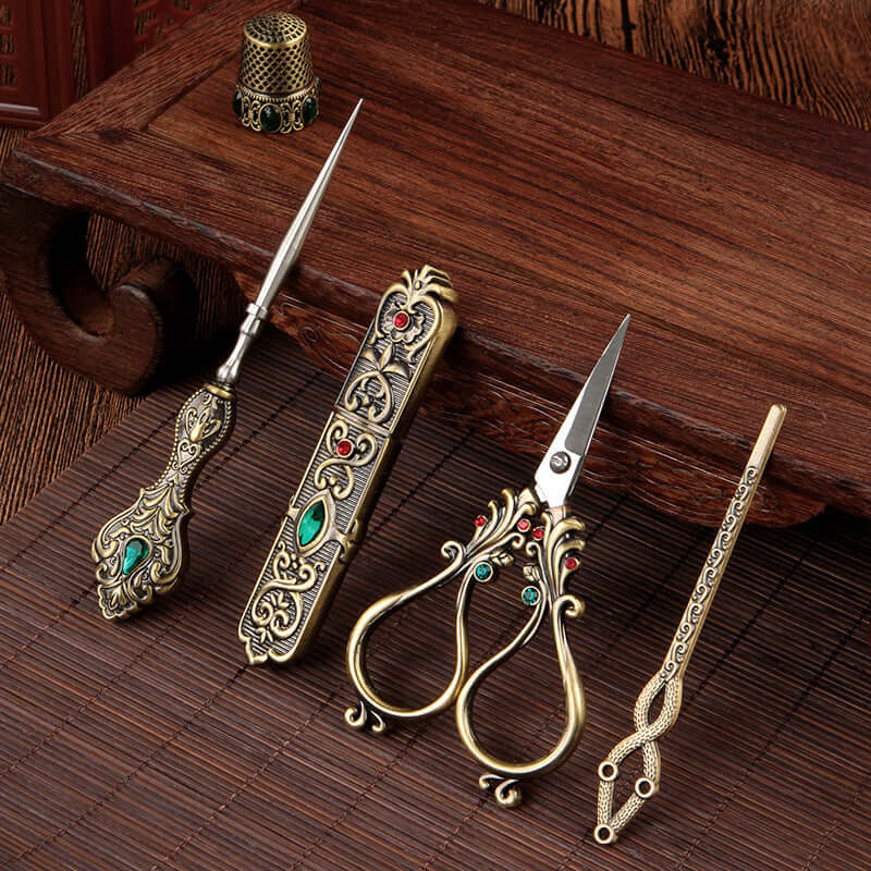 Affordable Luxury Inlaid With Phoenix Tail Scissors Set featuring ornate gold scissors and accessories.