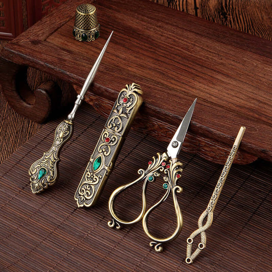 Affordable Luxury Inlaid With Phoenix Tail Scissors Set featuring ornate gold scissors and accessories.