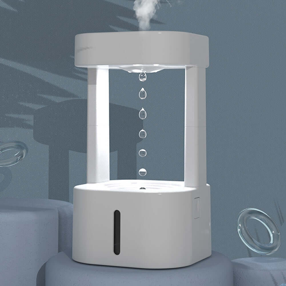 Creative anti-gravity humidifier with mist spray and water droplets, ideal for bedroom and office use.