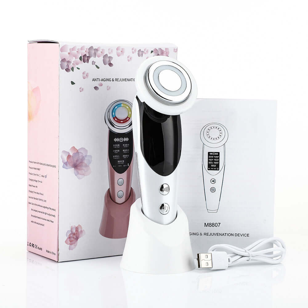 7-in-1 facial massager EMS micro-current device for skin rejuvenation and detoxification, with user manual and USB cable.