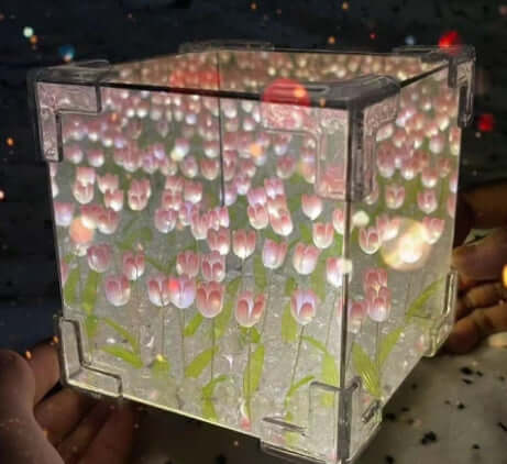 Handmade DIY tulip flower night light in a clear cube, showcasing vibrant pink blooms for romantic home decor.