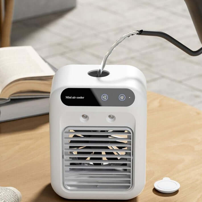 This portable air conditioner cools your space with water fan technology. Ideal for home, office, or car. Lightweight and energy-efficient.