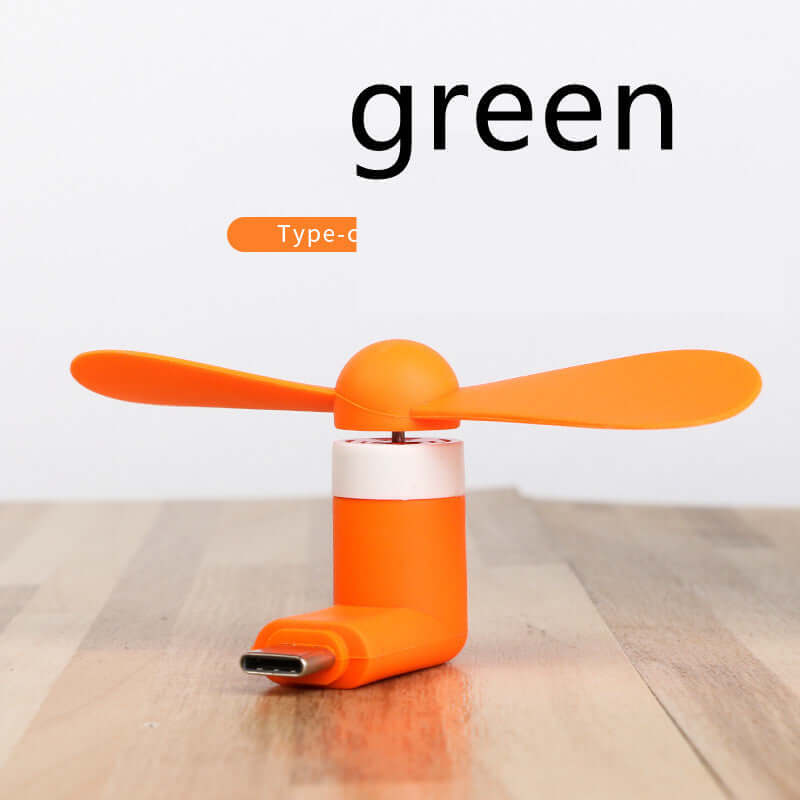 Mobile mini fan in orange, compatible with iPhone and Android, compact, low noise, eco-friendly, perfect for staying cool.