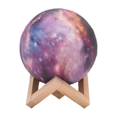 3D printing moon light galaxy lamp with wooden bracket, featuring vibrant galaxy colors and LED lighting.