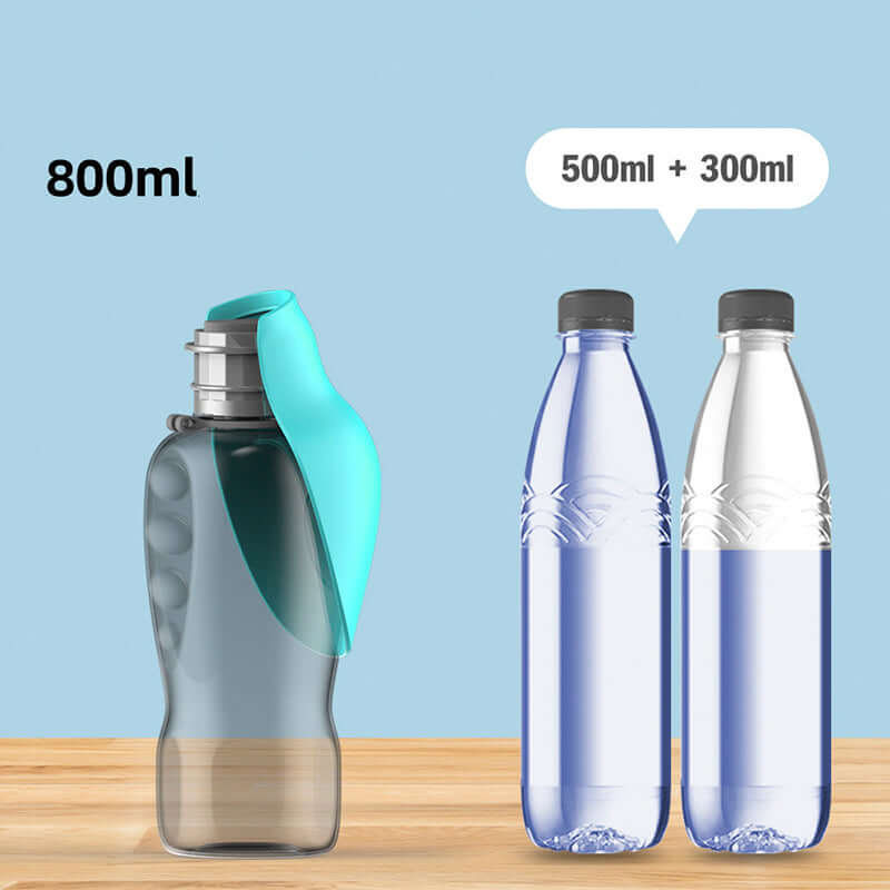 800ml portable dog water bottle next to two water bottles, showcasing its large capacity for outdoor activities.