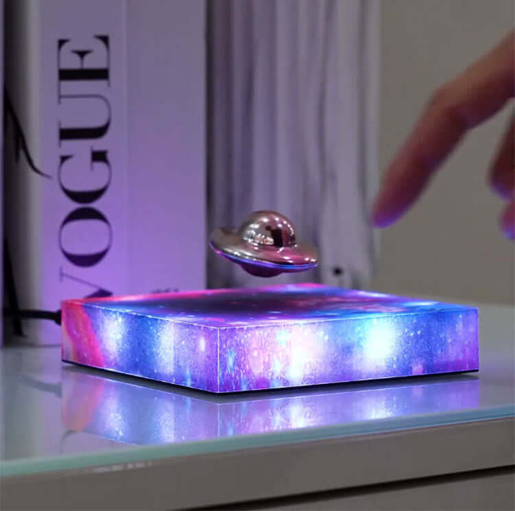 Levitating UFO Color Galaxy Lamp with magnetic base, showcasing vibrant lights and innovative design for home decor.