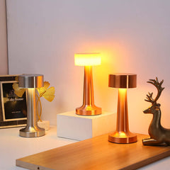 Modern rose gold metal table lamp with dimming feature