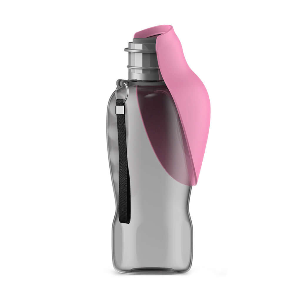 Portable dog water bottle with pink cap and wrist strap for outdoor activities.