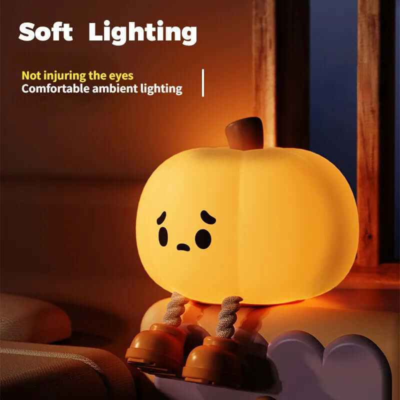 Cute pumpkin night light with soft ambient lighting, ideal for kids' bedrooms and Halloween decor.